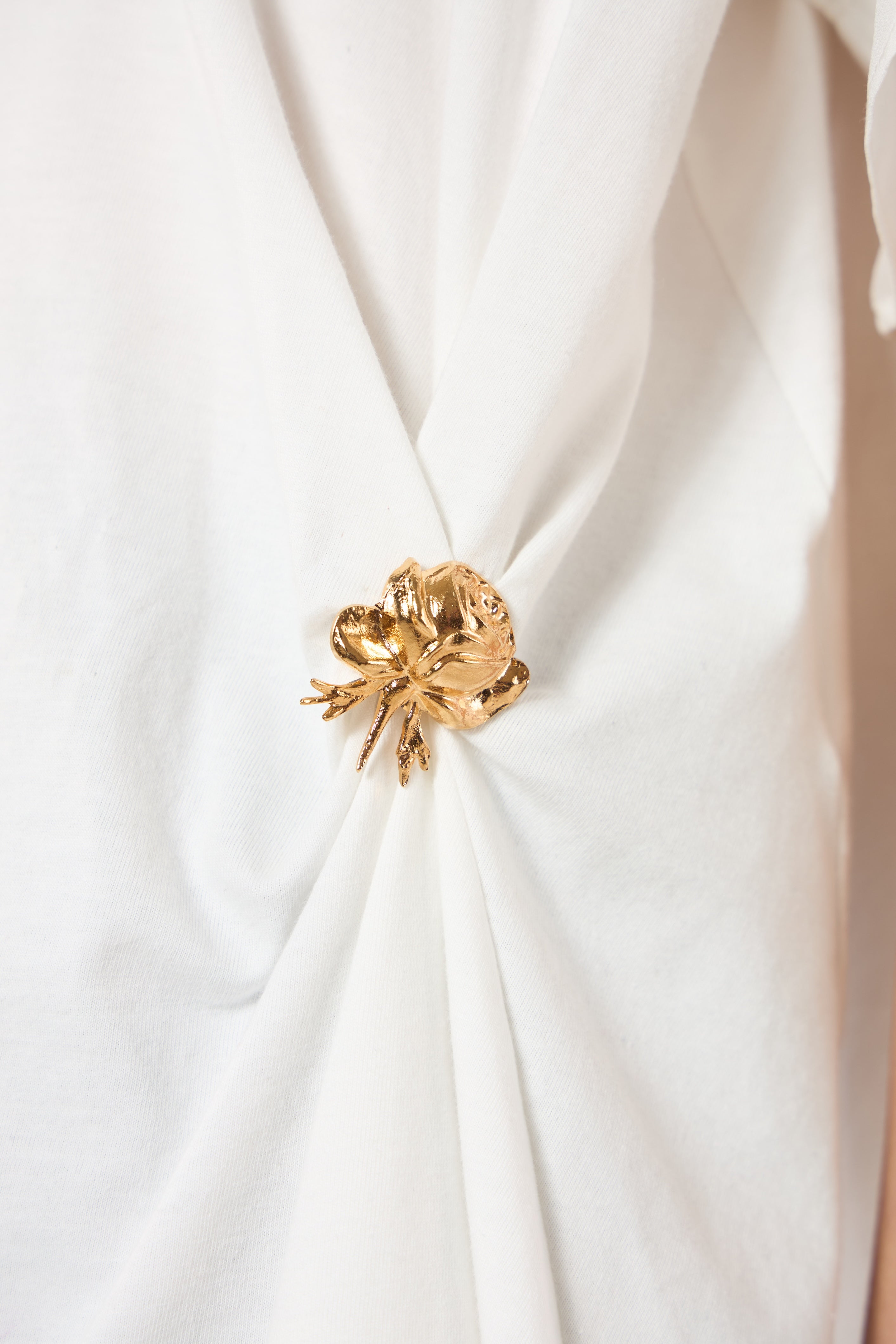 SK White Blouse With a Golden Brooch