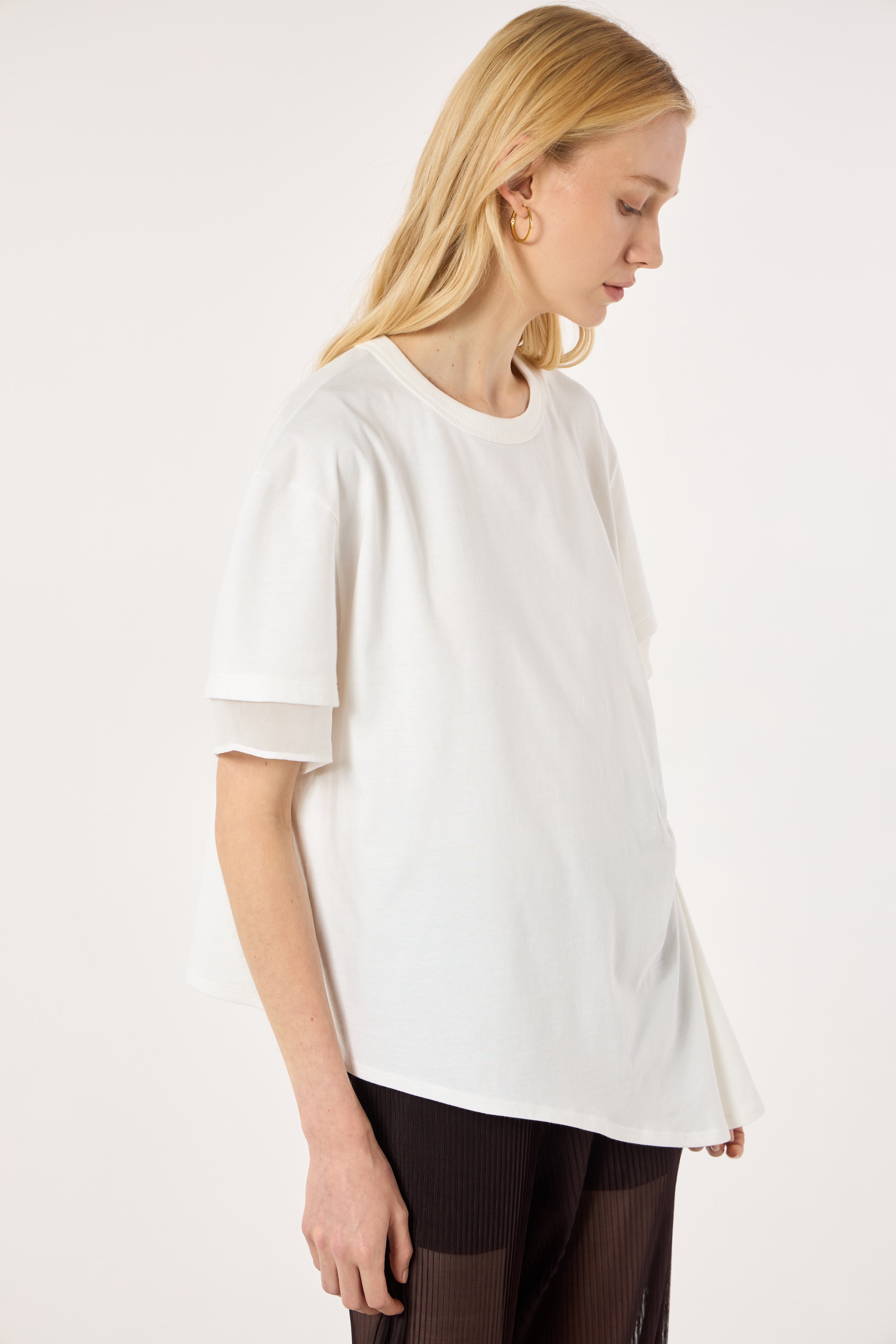 SK White Blouse With a Golden Brooch