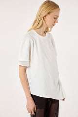 SK White Blouse With a Golden Brooch