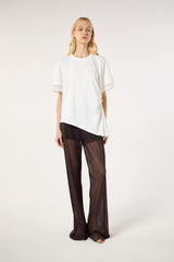 SK White Blouse With a Golden Brooch