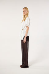 SK White Blouse With a Golden Brooch