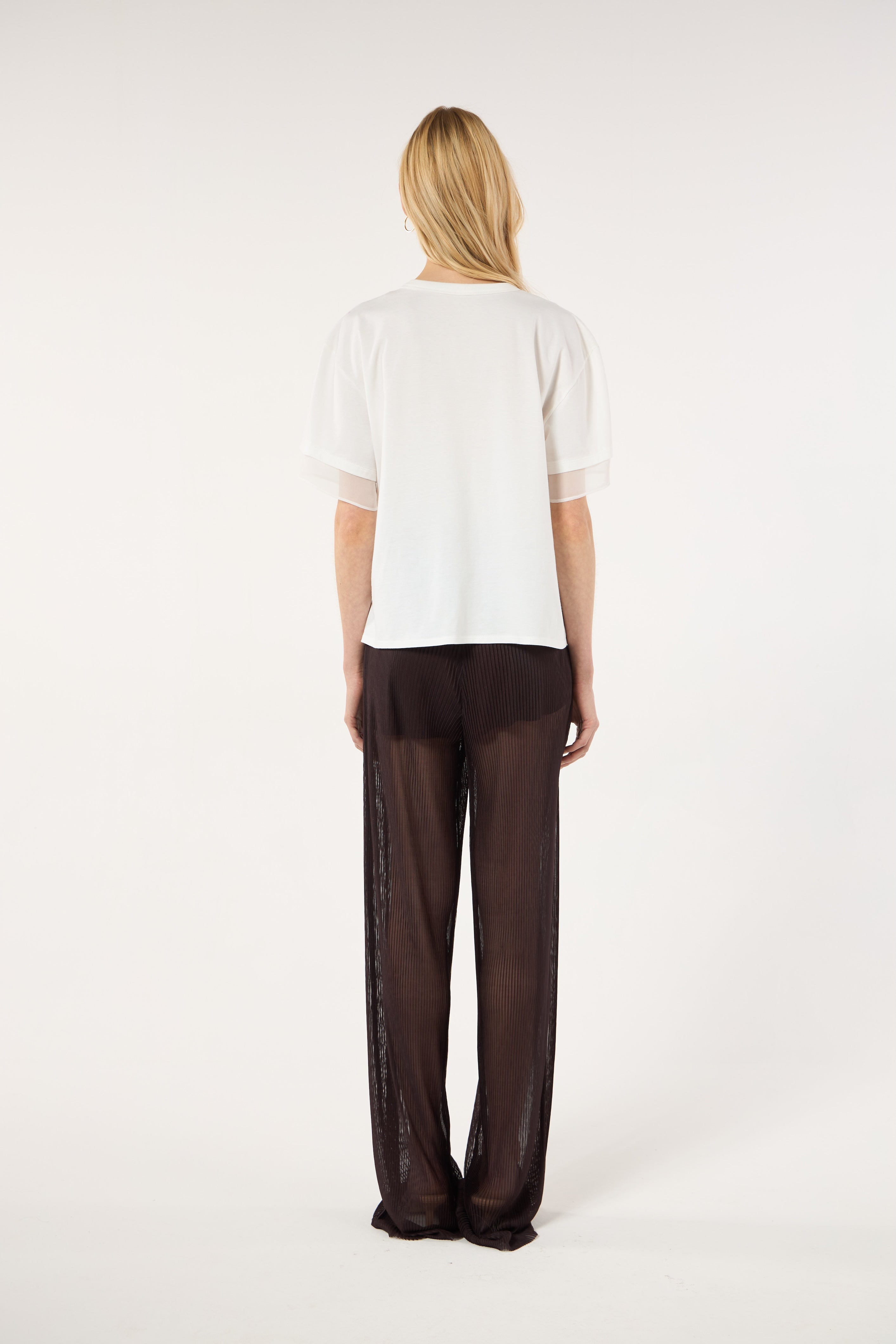 SK White Blouse With a Golden Brooch