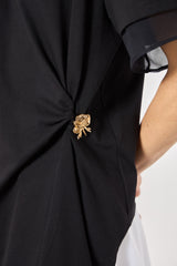 SK Black Blouse With a Golden Brooch
