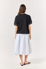 SK Black Blouse With a Golden Brooch